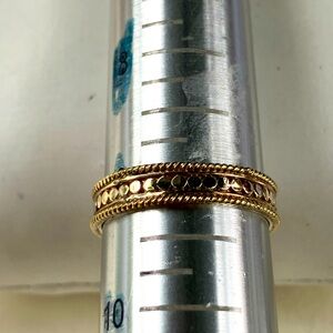 Elegant Anne Beck sterling silver ring with dots and braided along the edges.